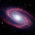 The dusty, winding arms (red) of a spiral galaxy similar to our own, called Messier 81, are illuminated here in unprecedented detail by the Spitzer Space Telescope. 